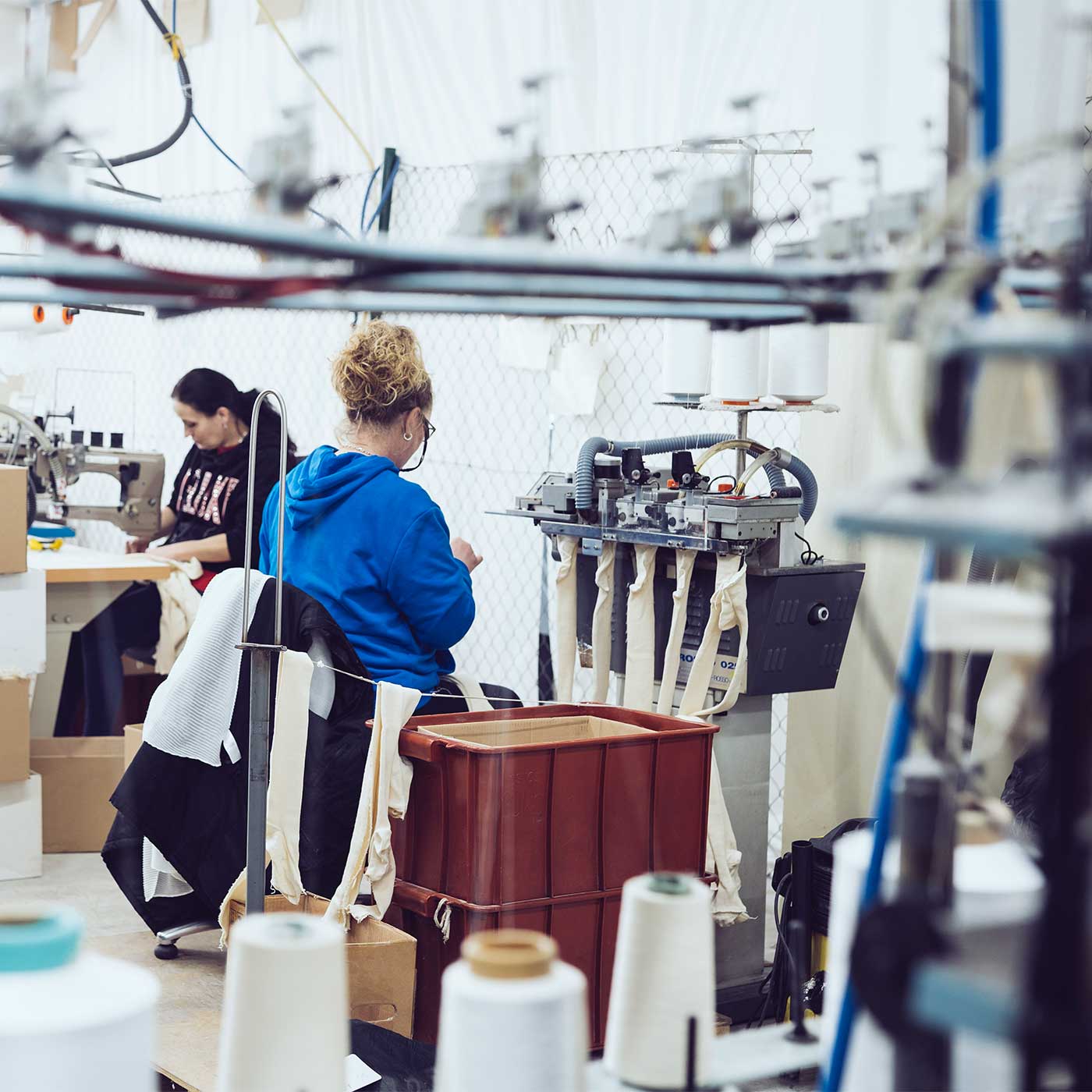 Artisans working at PEQNE tights factory
